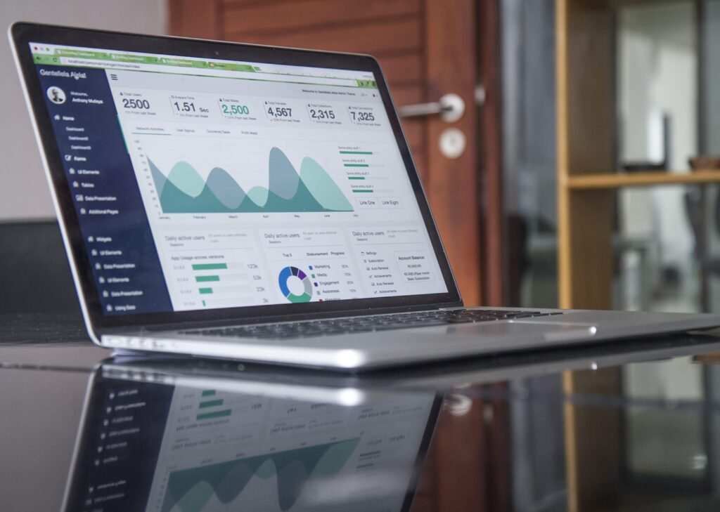 A laptop computer displaying graph of financial analysis for an investor seeking financial freedom
