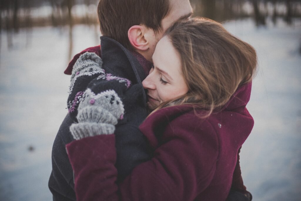 Couples embracing outside in love with each other